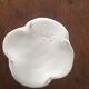 Two white porcelain flower candlesticks