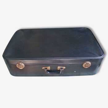 Black vintage suitcase in plastic and fabric