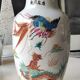 Large Chinese baluster vase. Exotic floral/dragon/bird designs. High 42 cm
