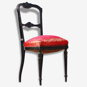 Pair of old black wooden chairs and Red seat.