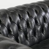 Black chesterfield 3-seater sofa made of cowhide leather in English style
