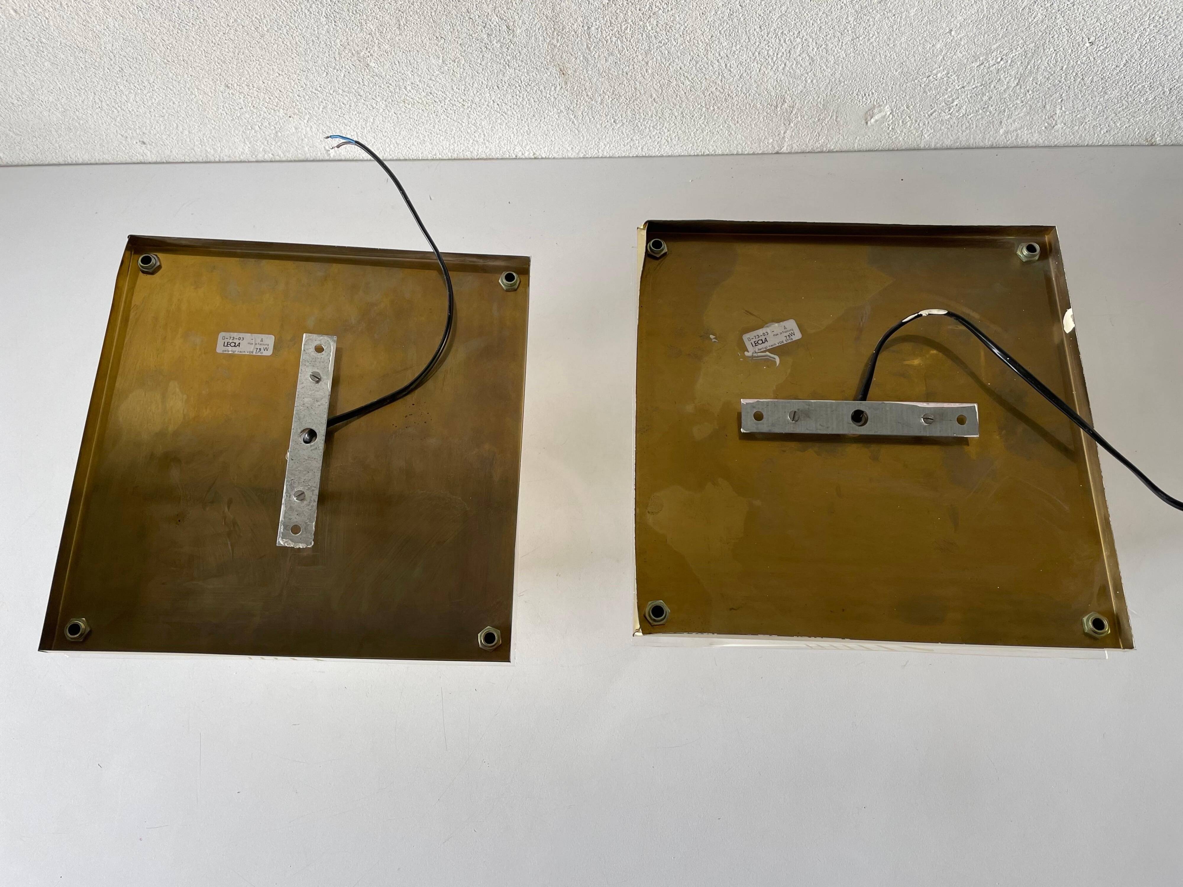 Pair of wall lights or flush mounts in plexiglass by Leola, 1970s, Germany.