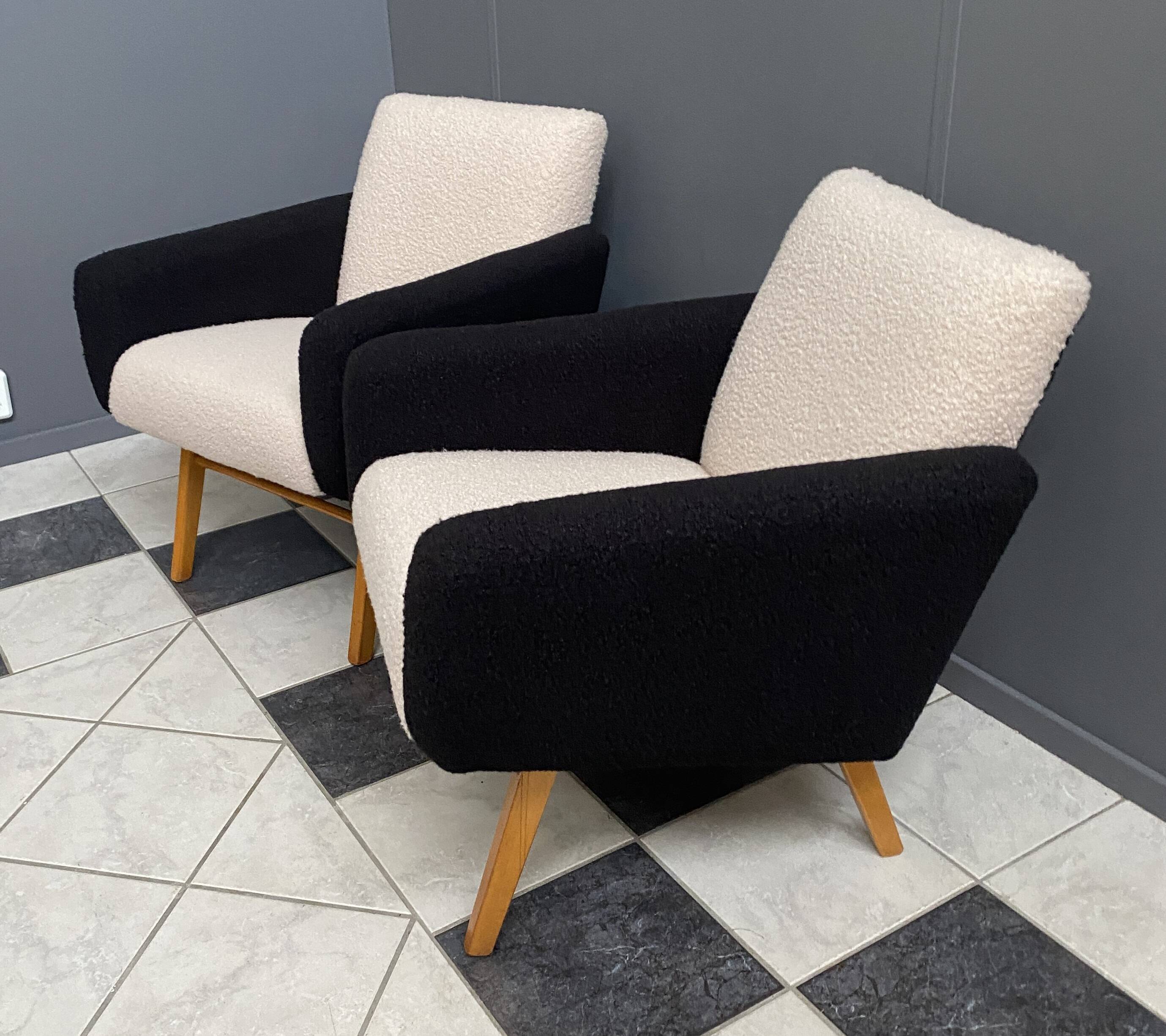 set of 2 black and White boucle lounge chairs 1960s