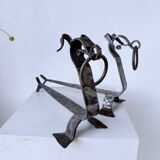 Pair of zoomorphic metal andirons "dogs" 1950