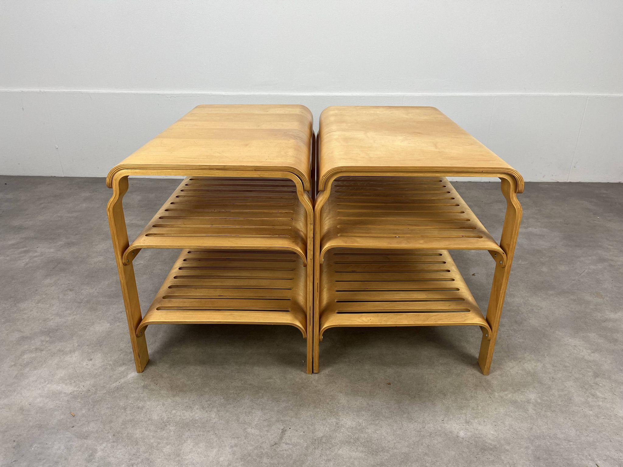 Pair of curved wooden entrance benches 1980