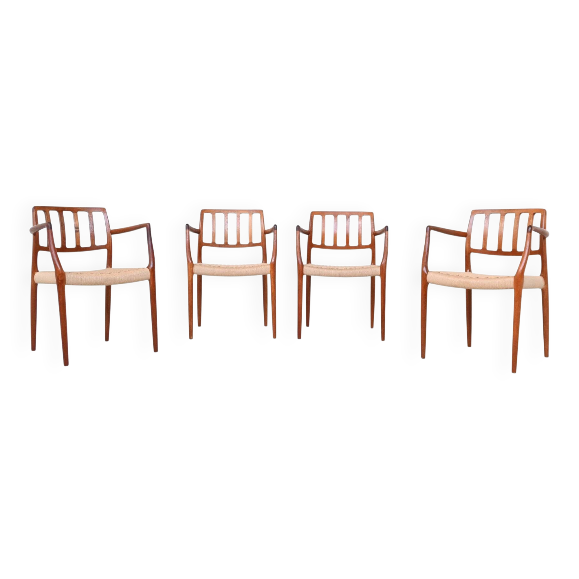 Niels Otto Moller model 66 armchairs teak and paper cord Denmark 1974