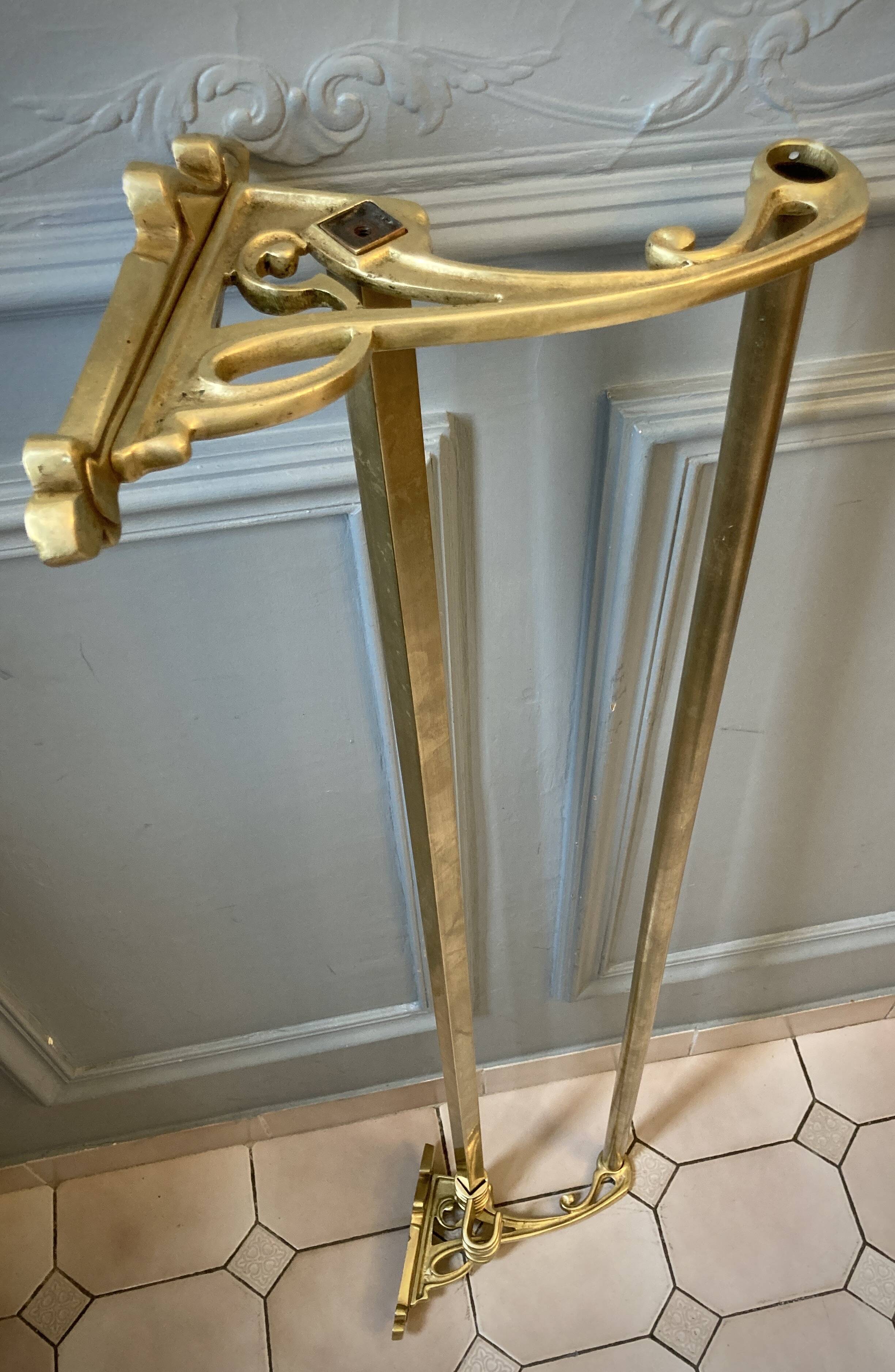 Art-deco wall-mounted coat rack in brass