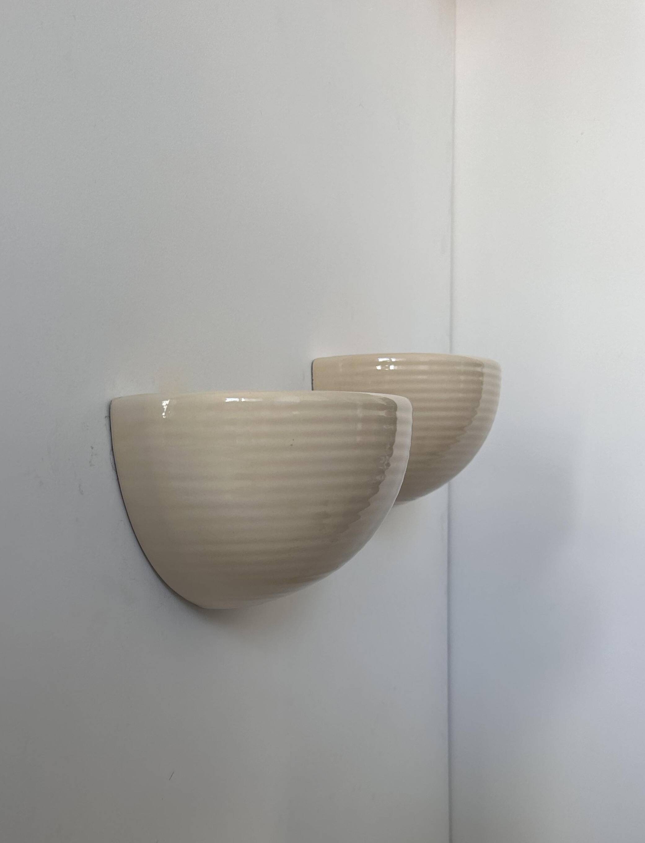 Pair of vintage wall lights, beige porcelain, France 1970