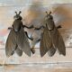 2 metal ashtrays with insect fly designs from the 1950s-60s.