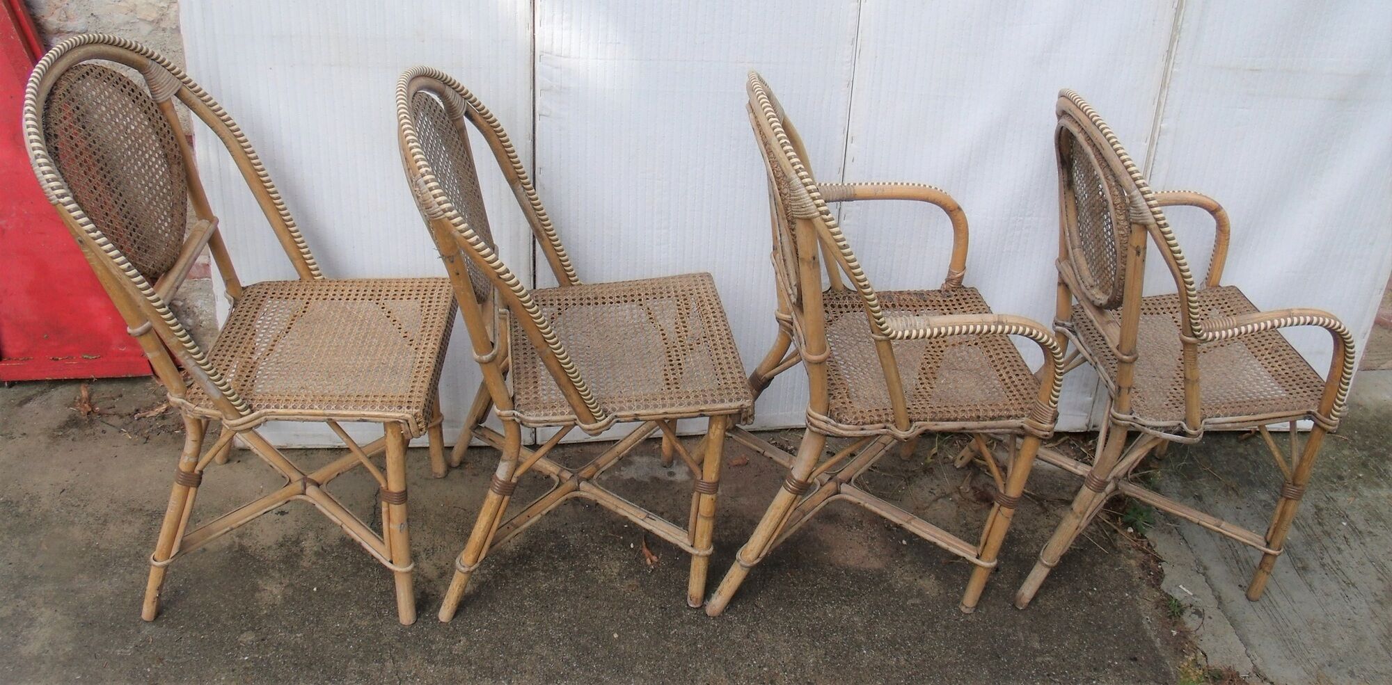 Set of chairs and cannate armchairs of bistro terasse de bar