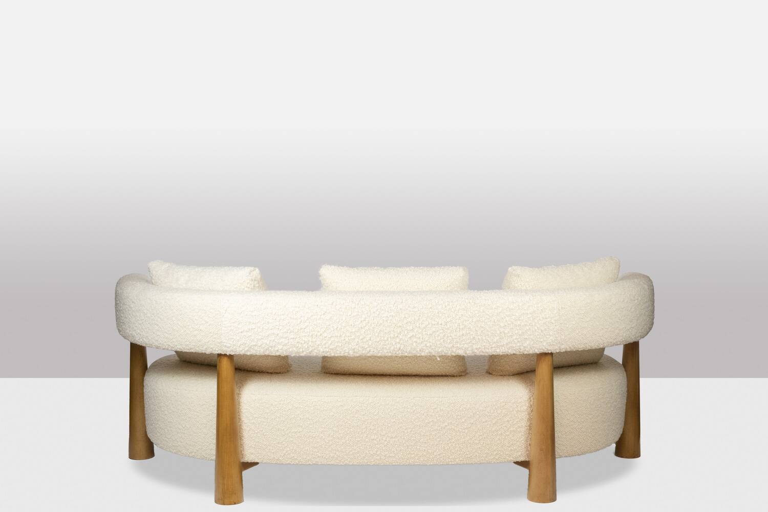 “Bean” shaped 3-seater sofa, in blond beech. Contemporary work