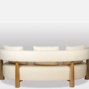 “Bean” shaped 3-seater sofa, in blond beech. Contemporary work