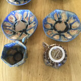 9 octagonal cups and octagonal cups in glazed stoneware G Metenier