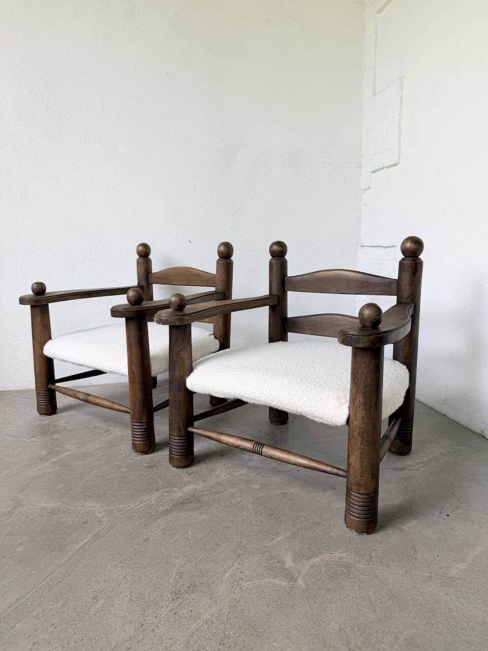 Pair of Dudouyt armchairs from the 1950s, oak.