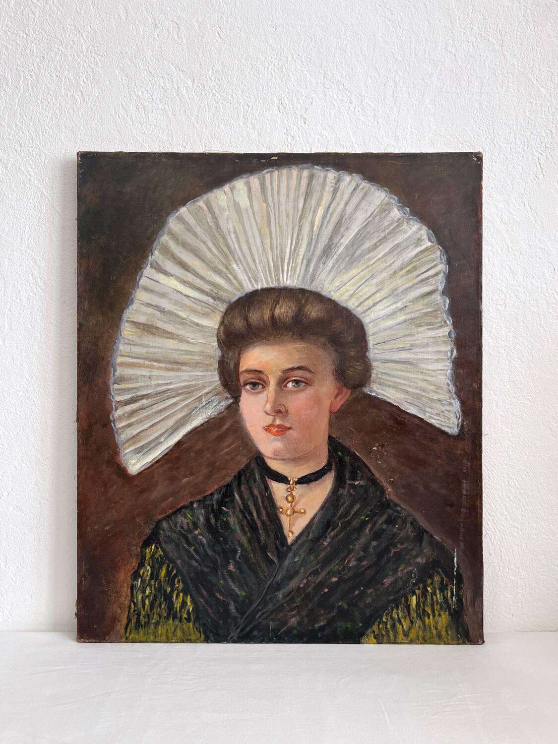 Old oil painting on canvas portrait of a woman in traditional costume