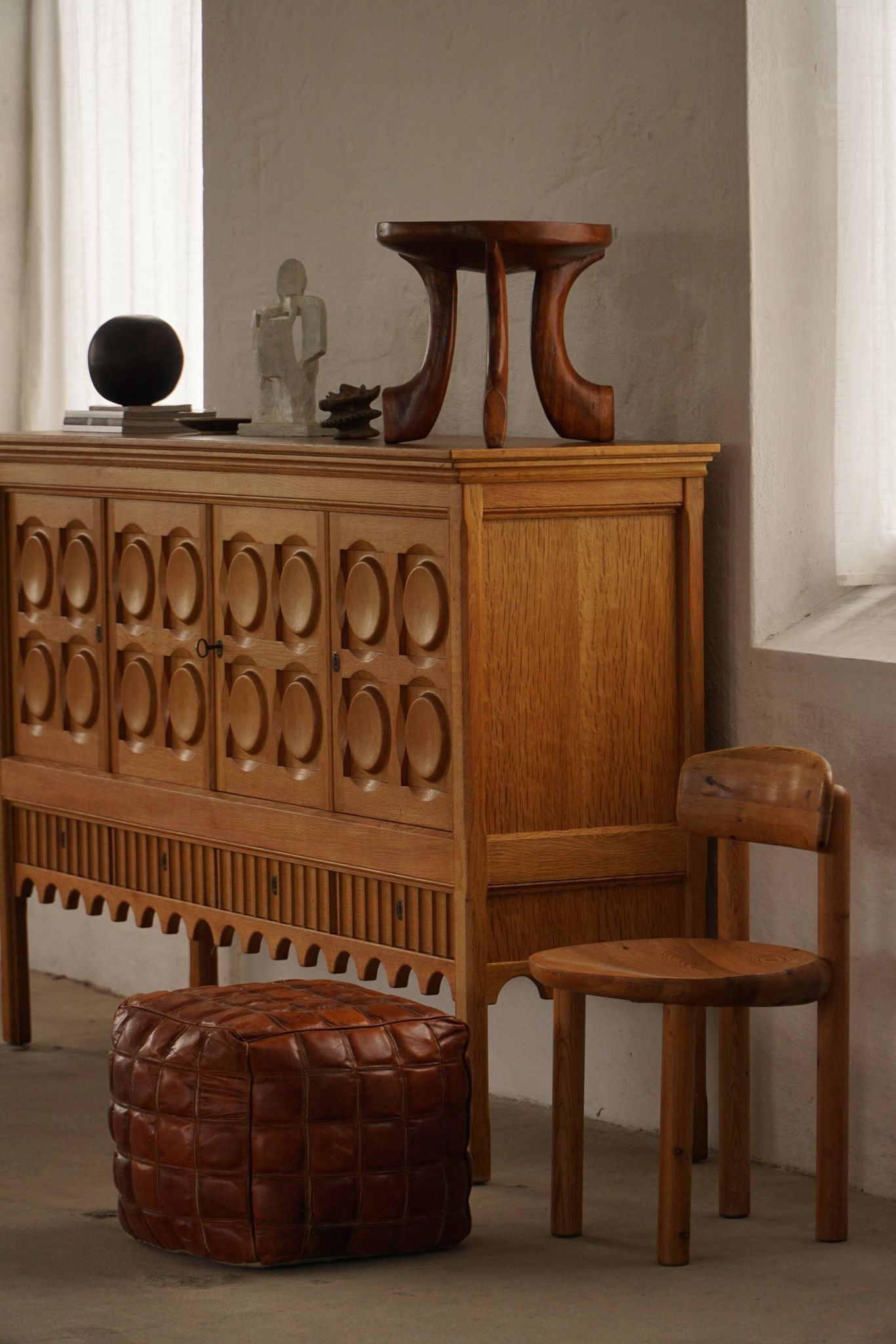Oromo stool from mid-20th century Africa, hand-carved wood, tribal style.