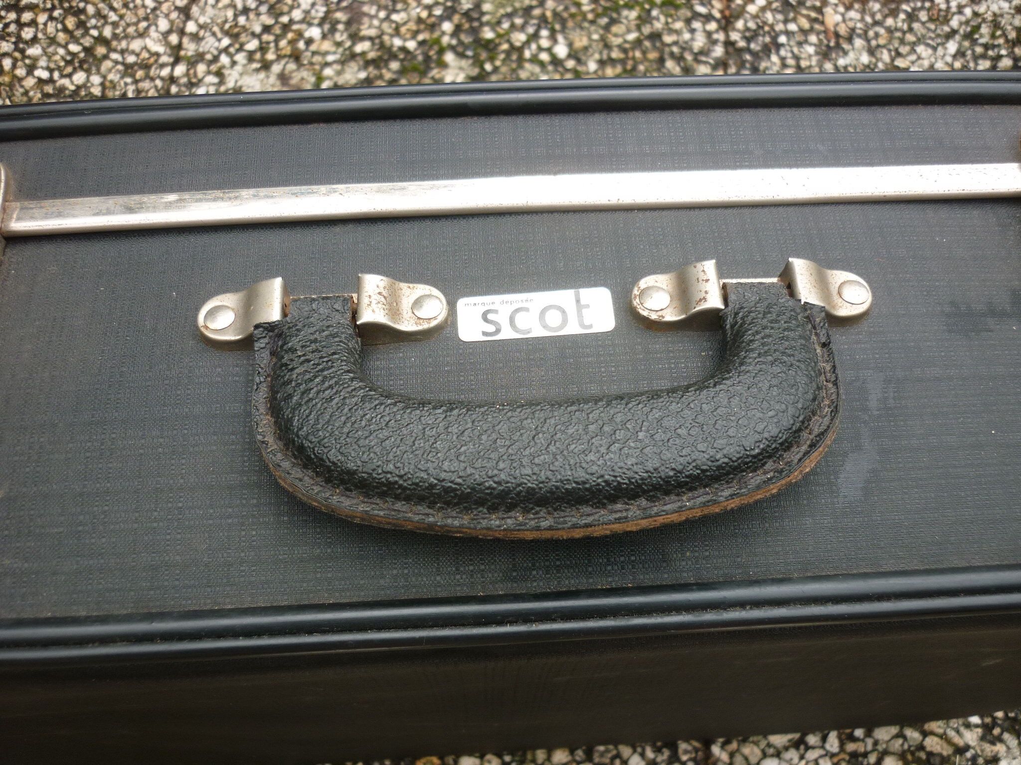 Black antique suitcase, registered trademark scot