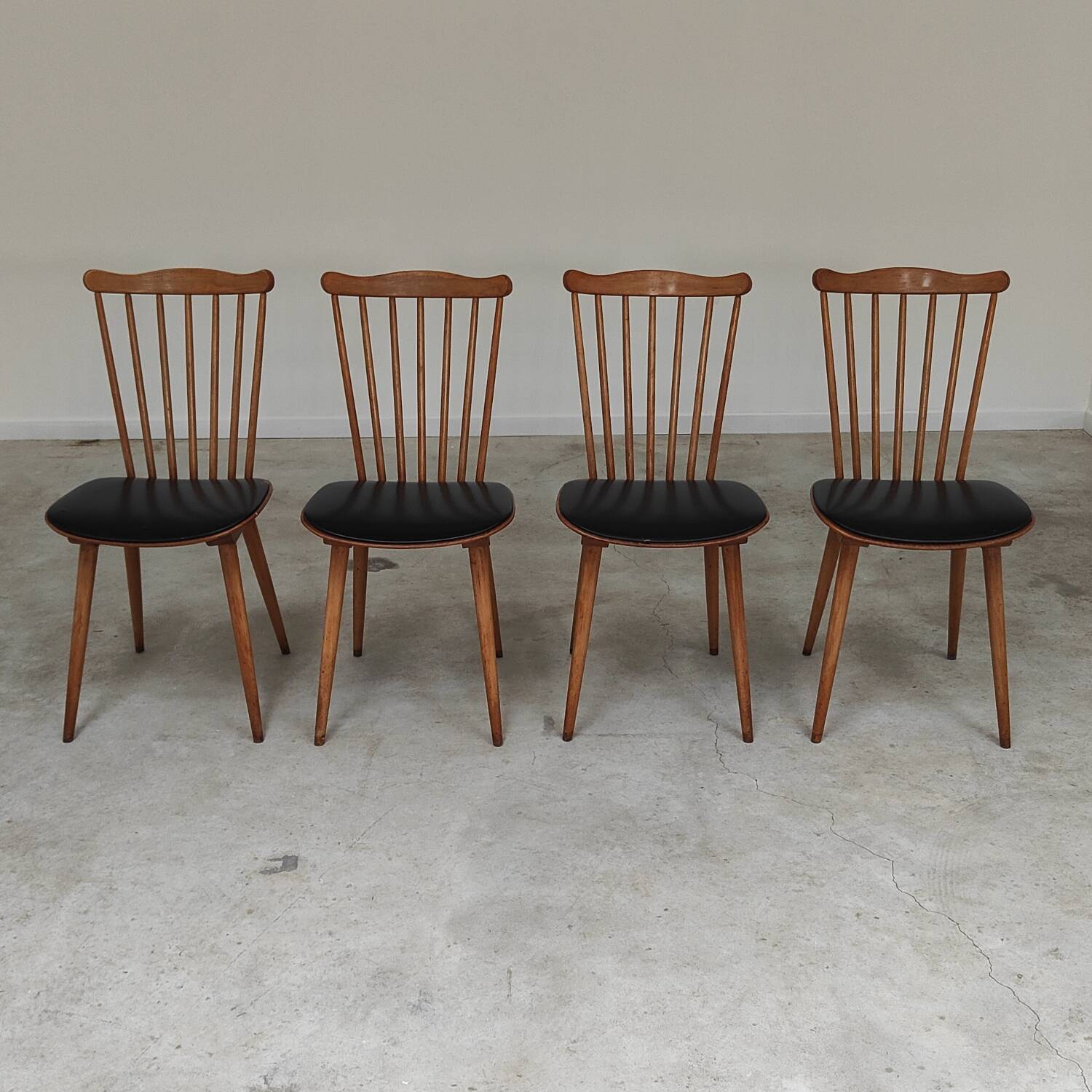 Set of 4 Baumann Menuet chairs in wood and compass feet