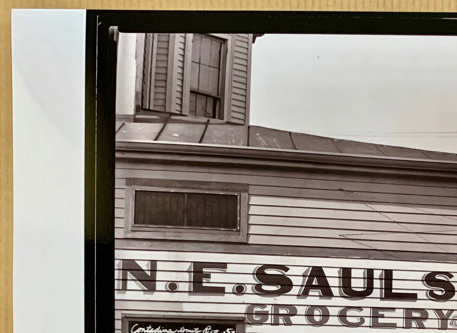 "Street corner in New Orleans, front of the NE Saul' sandwich shop
