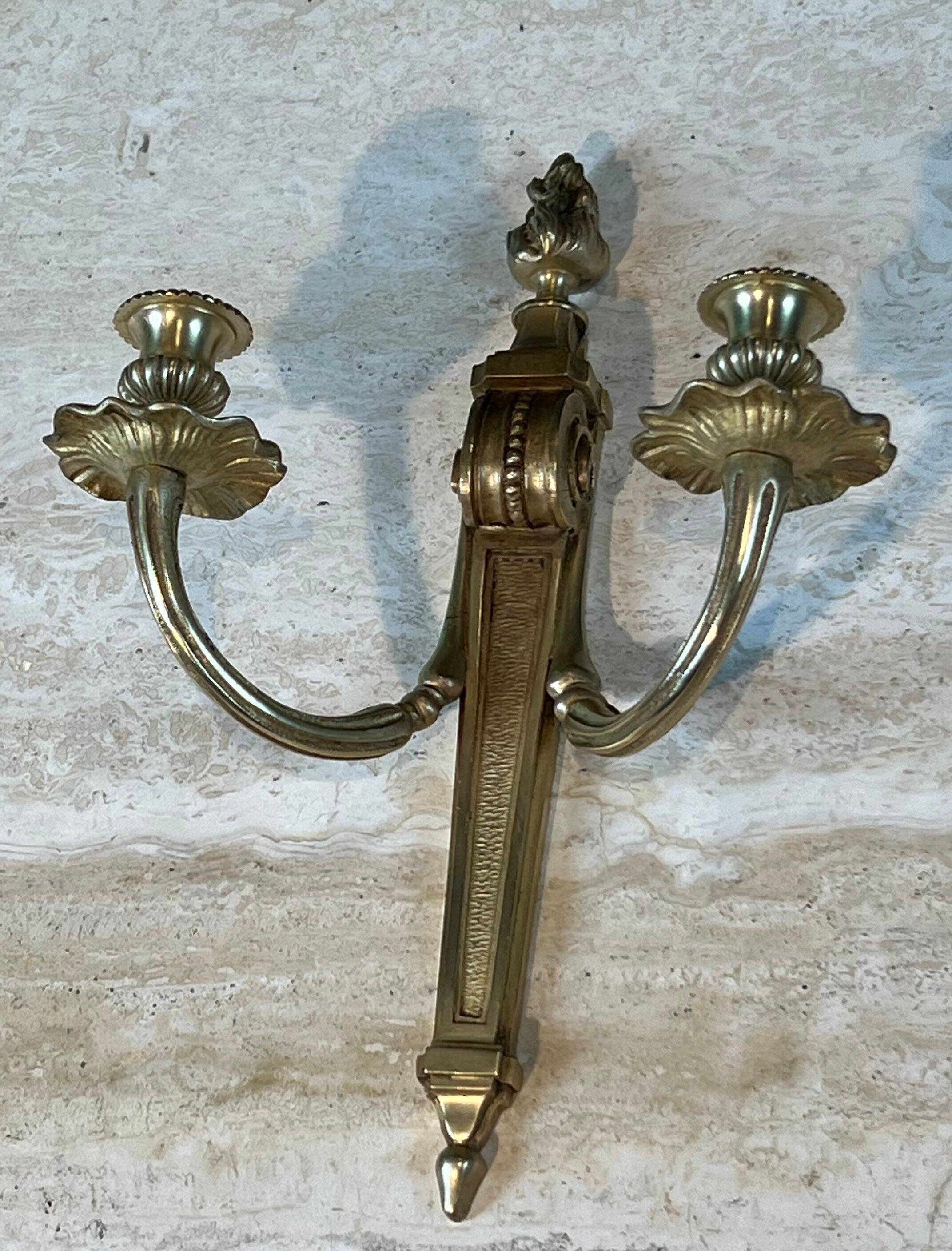 Pair of Louis XVI style bronze wall sconces