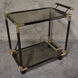 Black metal and brass rolling dessert trolley, smoked glass, 1970s.
