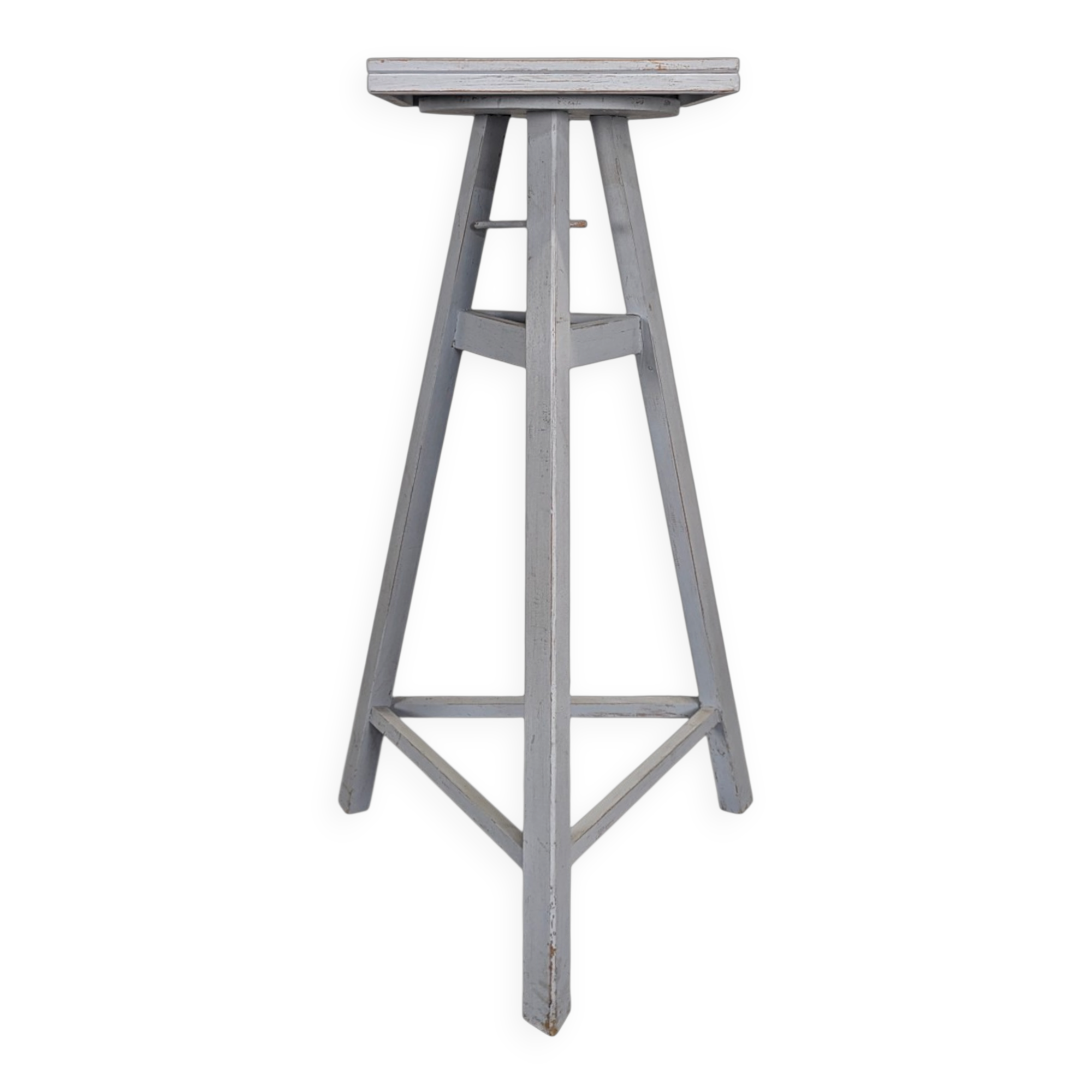 Tripod sculptor's stool in grey painted wood with a rotating top.