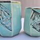 Set of 4 Art Deco celadon green and silver barbotine pots.
