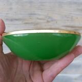 Green glass ashtray set in gold brass