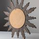 Convex sunburst mirror in carved and gilded wood, 1950s