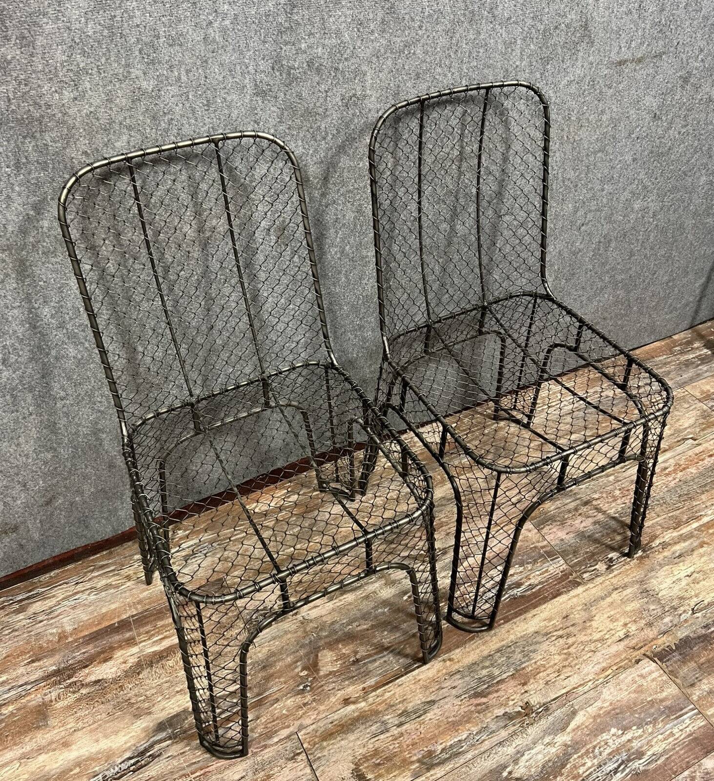 Pair of industrial design chairs in woven iron circa 1980