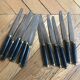 Twelve Ebony Bakelite Knives