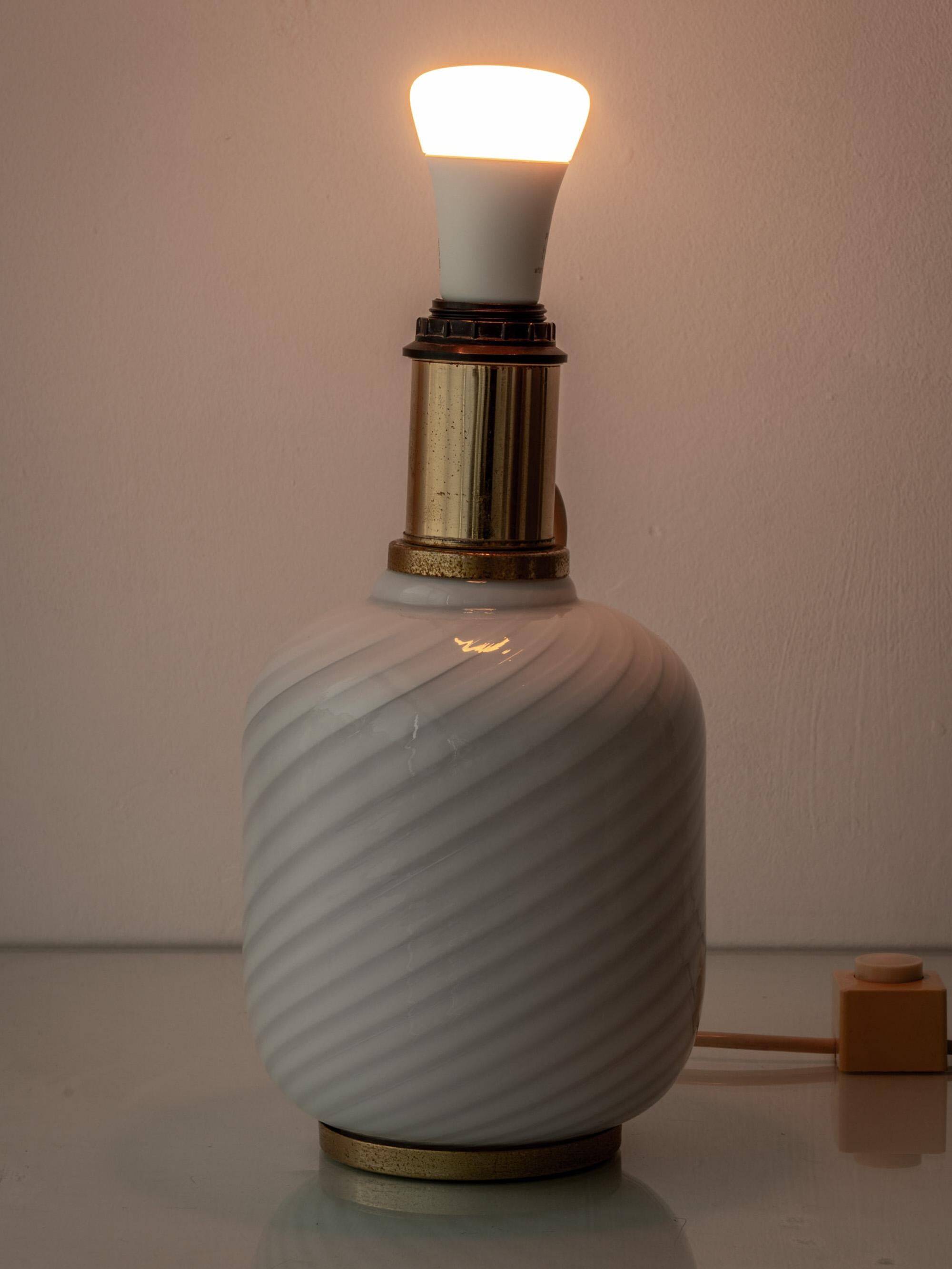 Pair of mid-century Murano glass table lamps with three light settings, Italy.