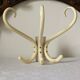 Wall-mounted parrot coat rack