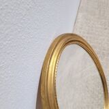 Ancien miroir ovale doré et frise 40x53cm