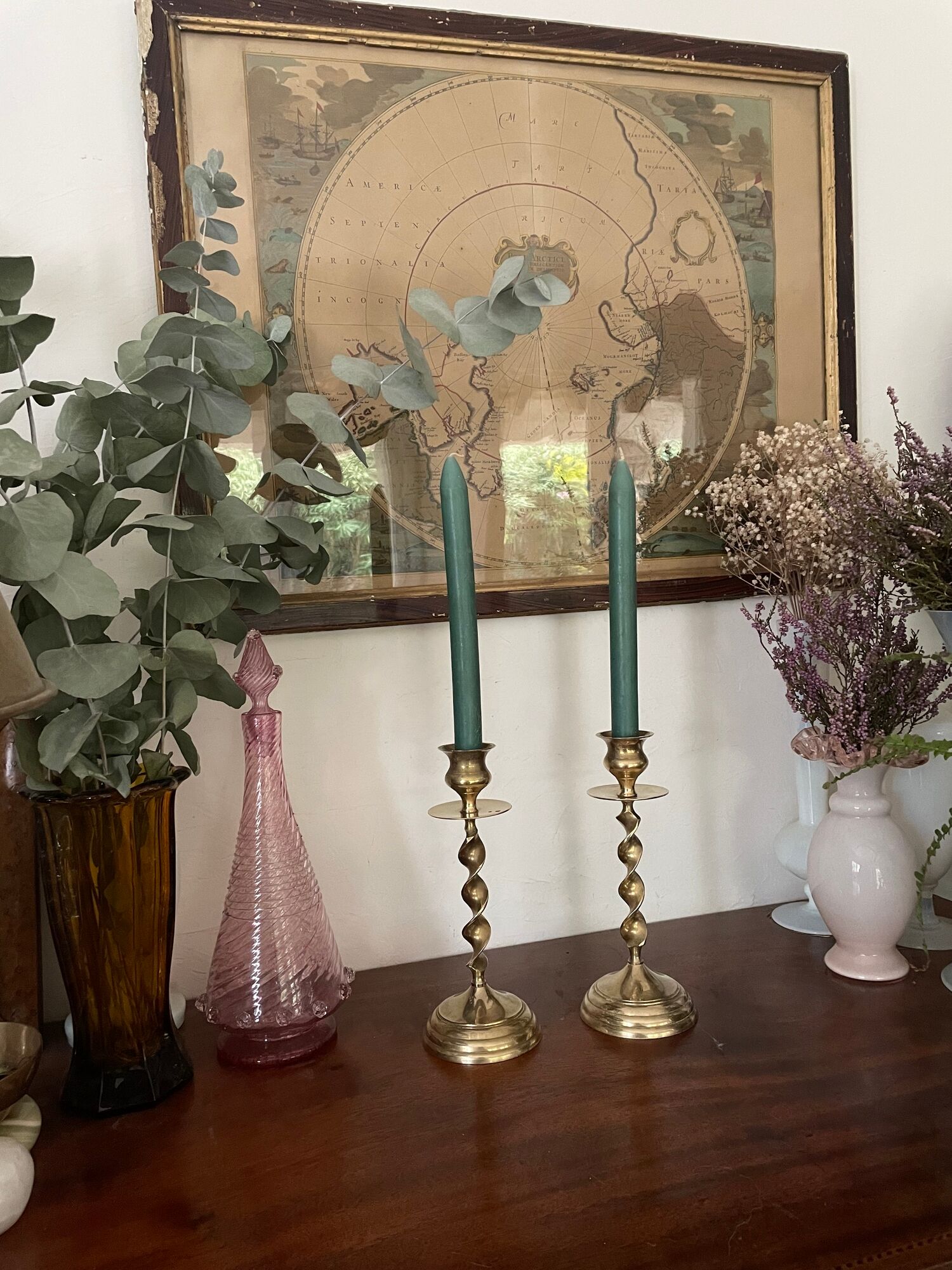Pair of twisted brass candle holders