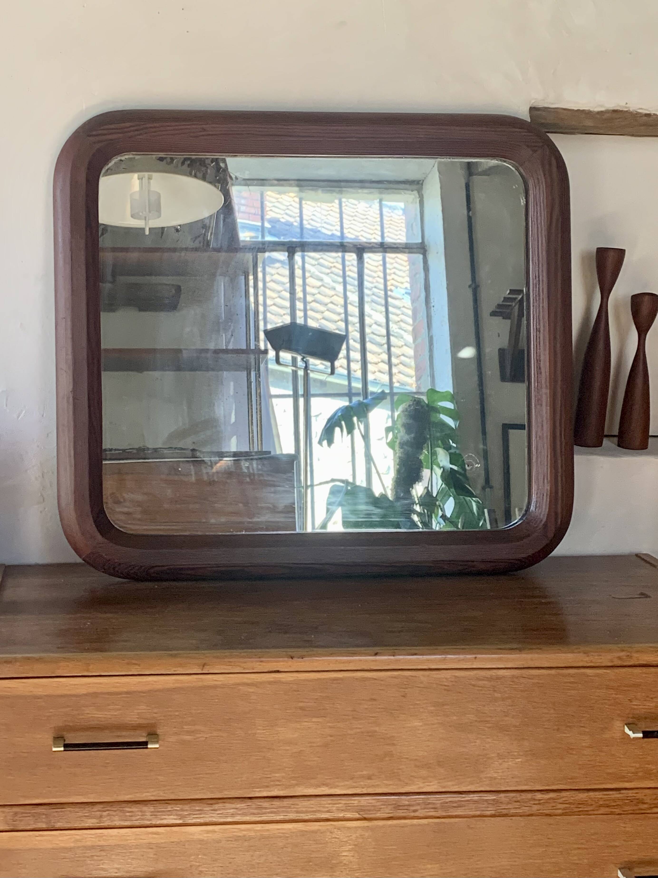 Old vintage wooden wall mirror
