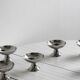 6 silver-plated metal bowls.