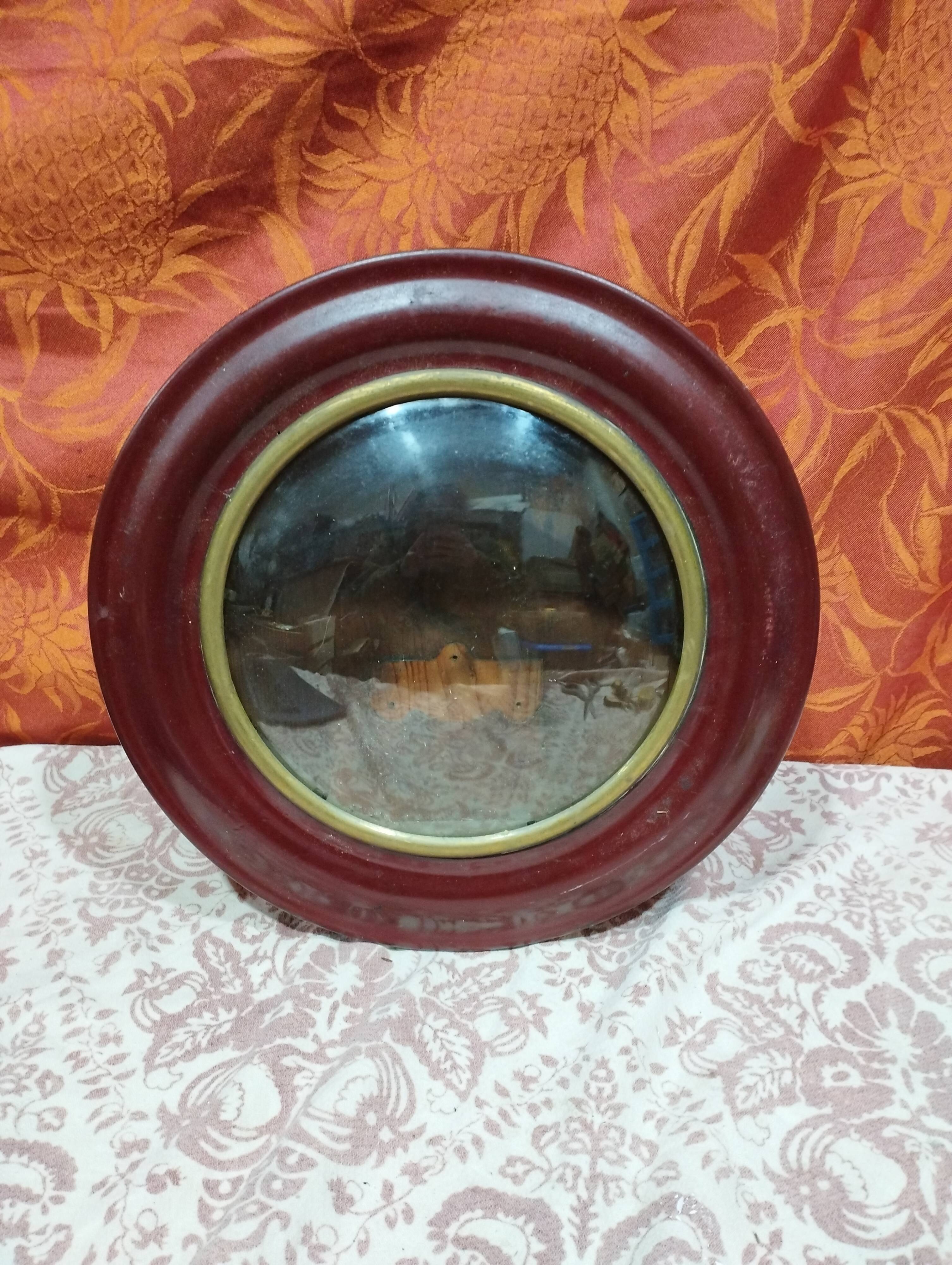 Small round bull's eye wall display case in wood and curved glass