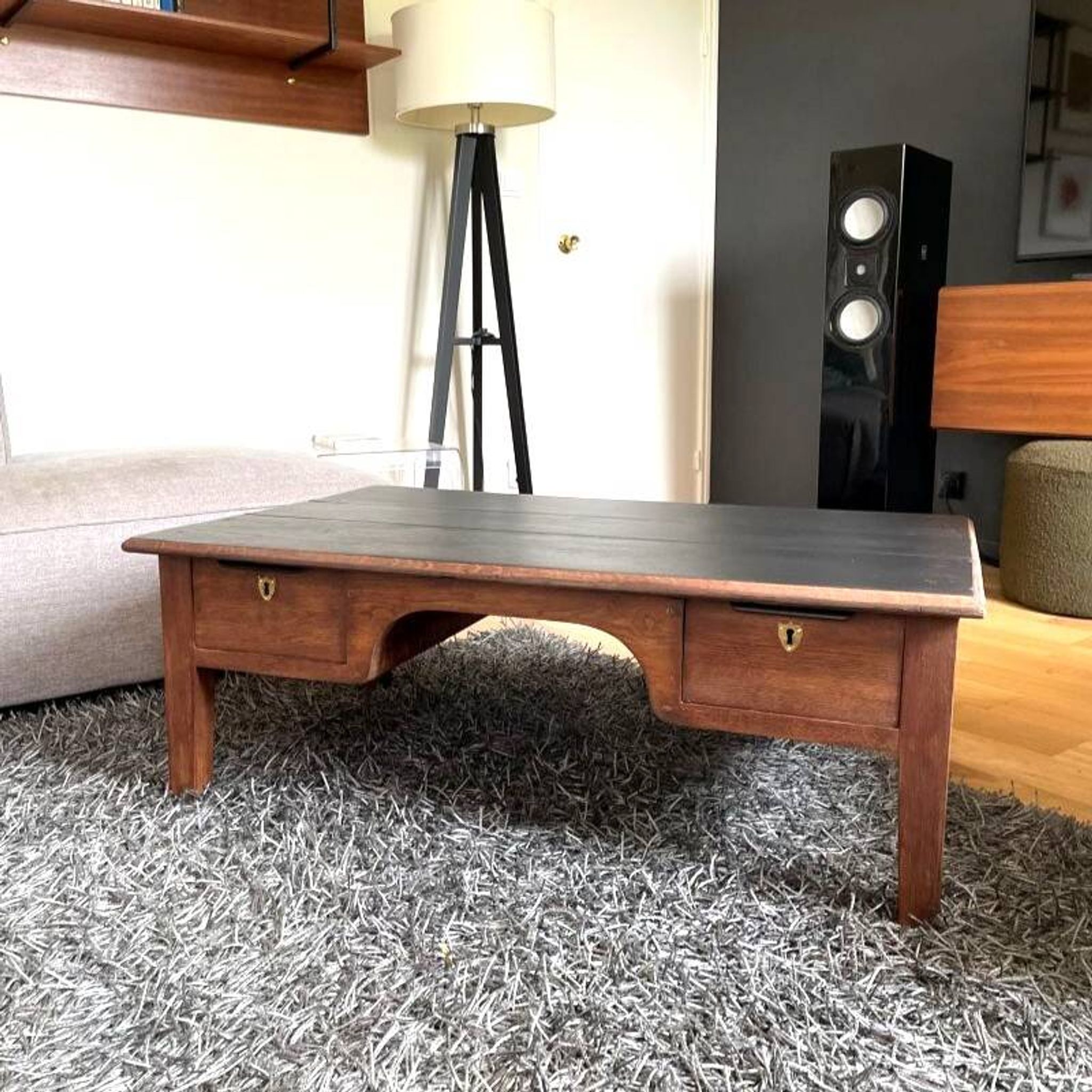 Wooden coffee table with black top