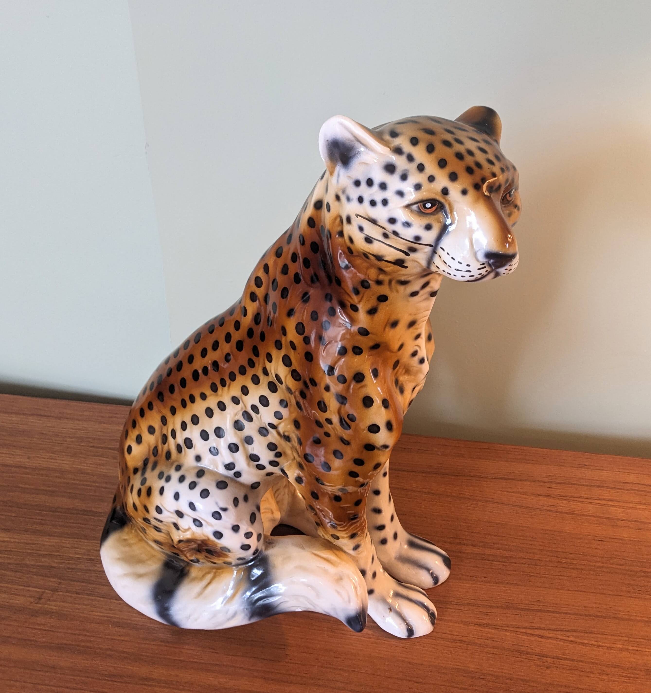 Cheetah sculpture in ceramic