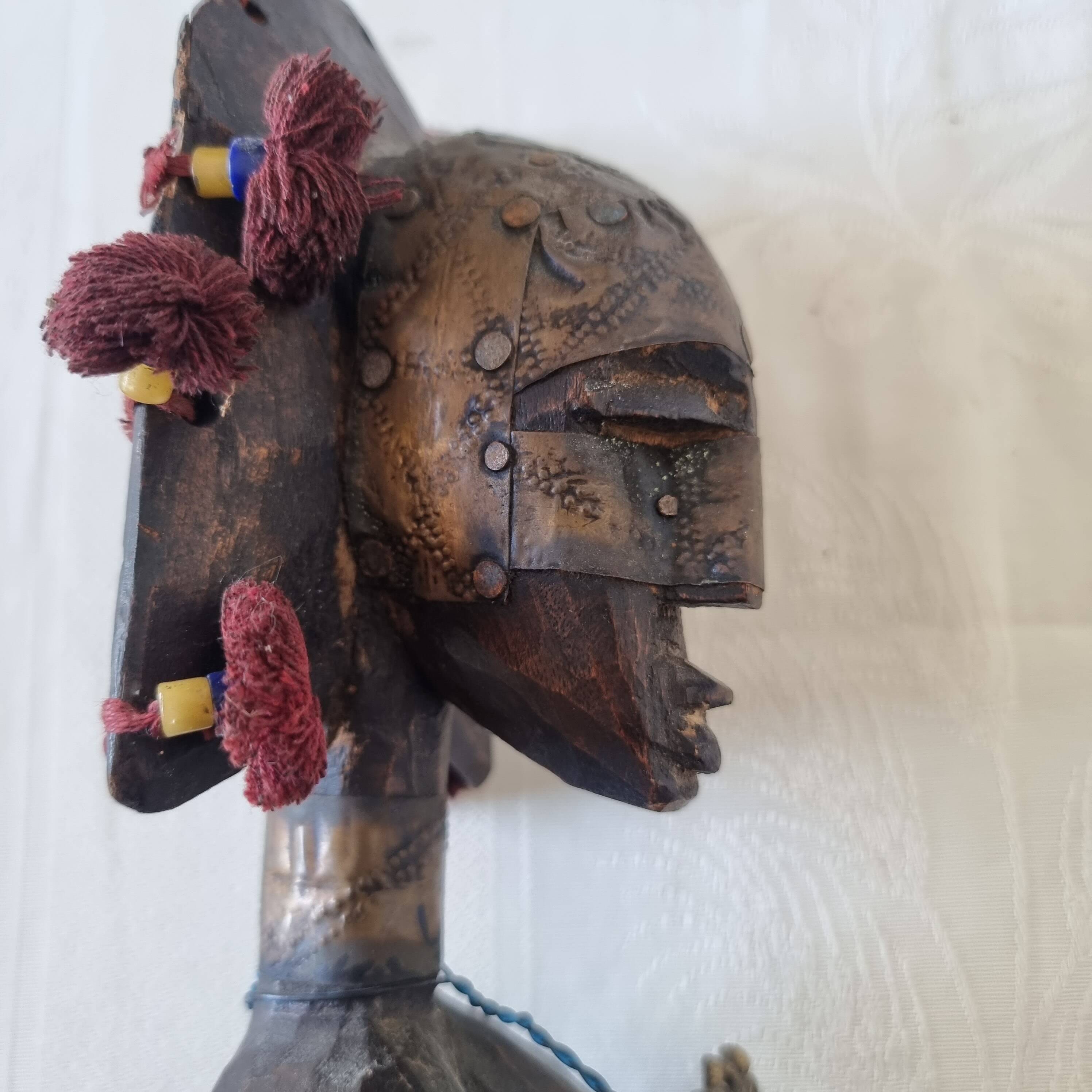 Scepter decorated with a female figure in wood and brass