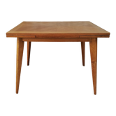 Oak table has two vintage extensions