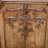 Liège bookcase in carved oak Regency style