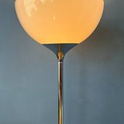 Guzzini Flash Space Age floor lamp with a chrome base and white acrylic shade.