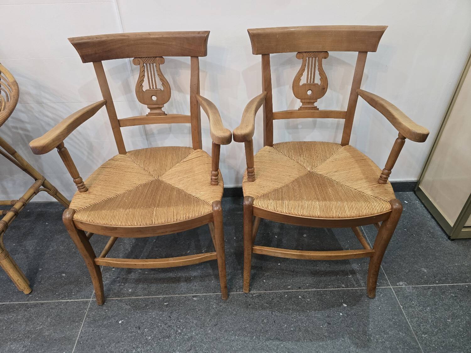 Pair of antique lyre-shaped armchairs – woven straw seats