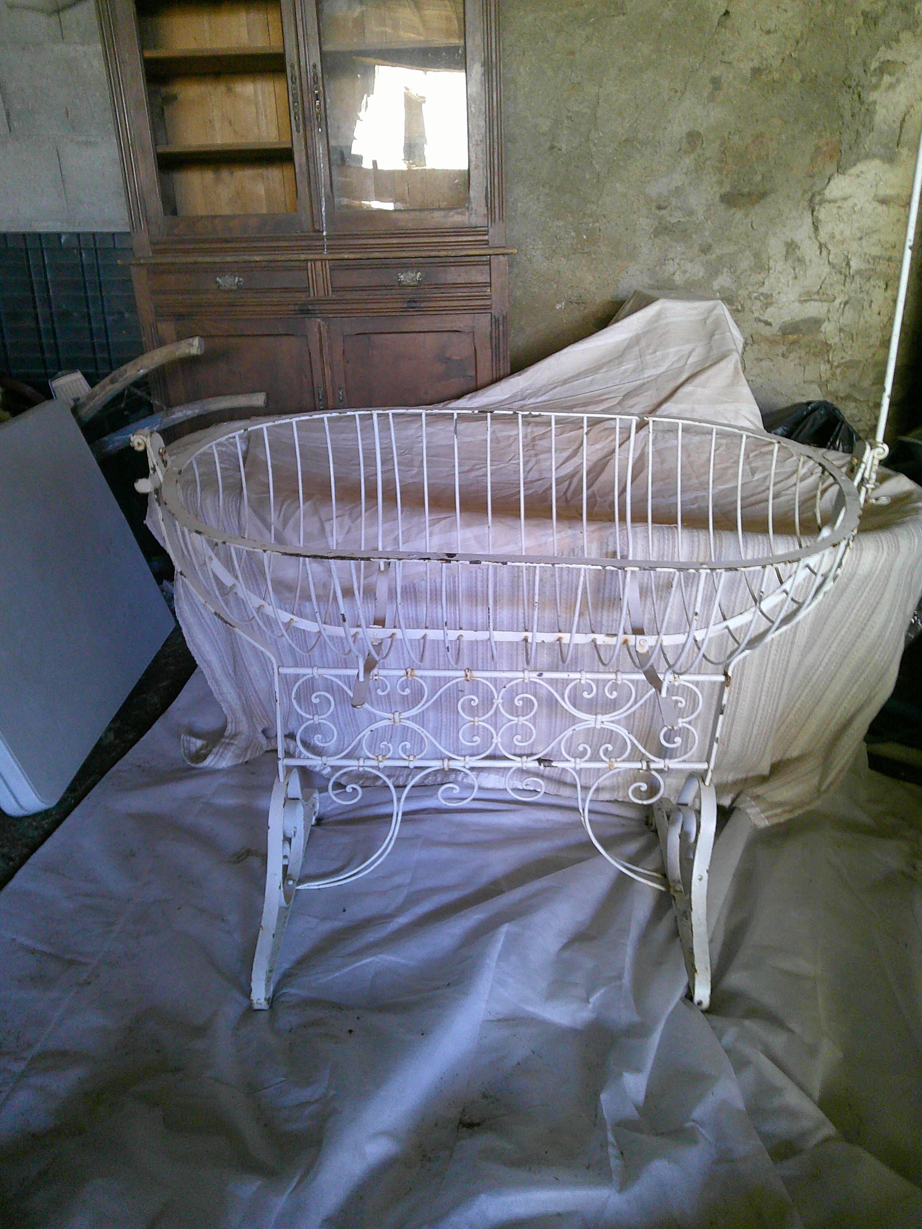 Wrought iron rocking cradle