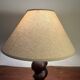 Solid turned wood foot lamp with lampshade