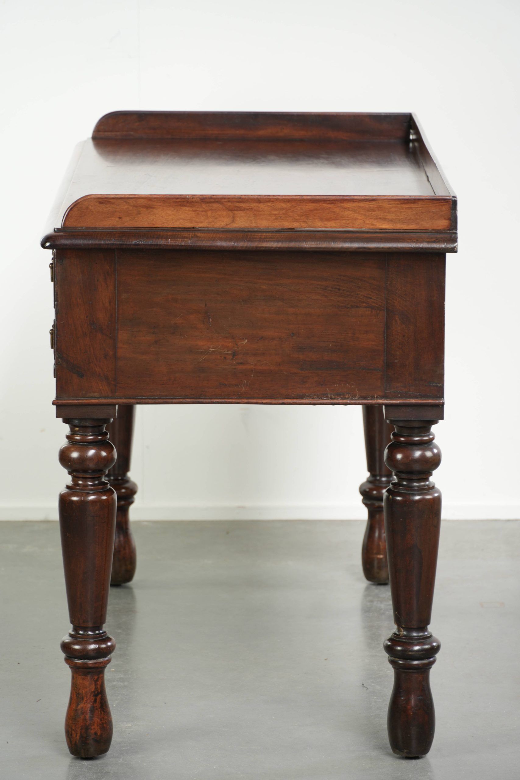 Elegant antique English desk / writing table from the mid-19th century