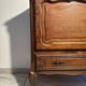 Louis XV style oak TV cabinet with drop-down flap.