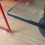 Gae Aulenti coffee table for Fontana Arte, transparent glass top with black cast iron supports, 1980s.